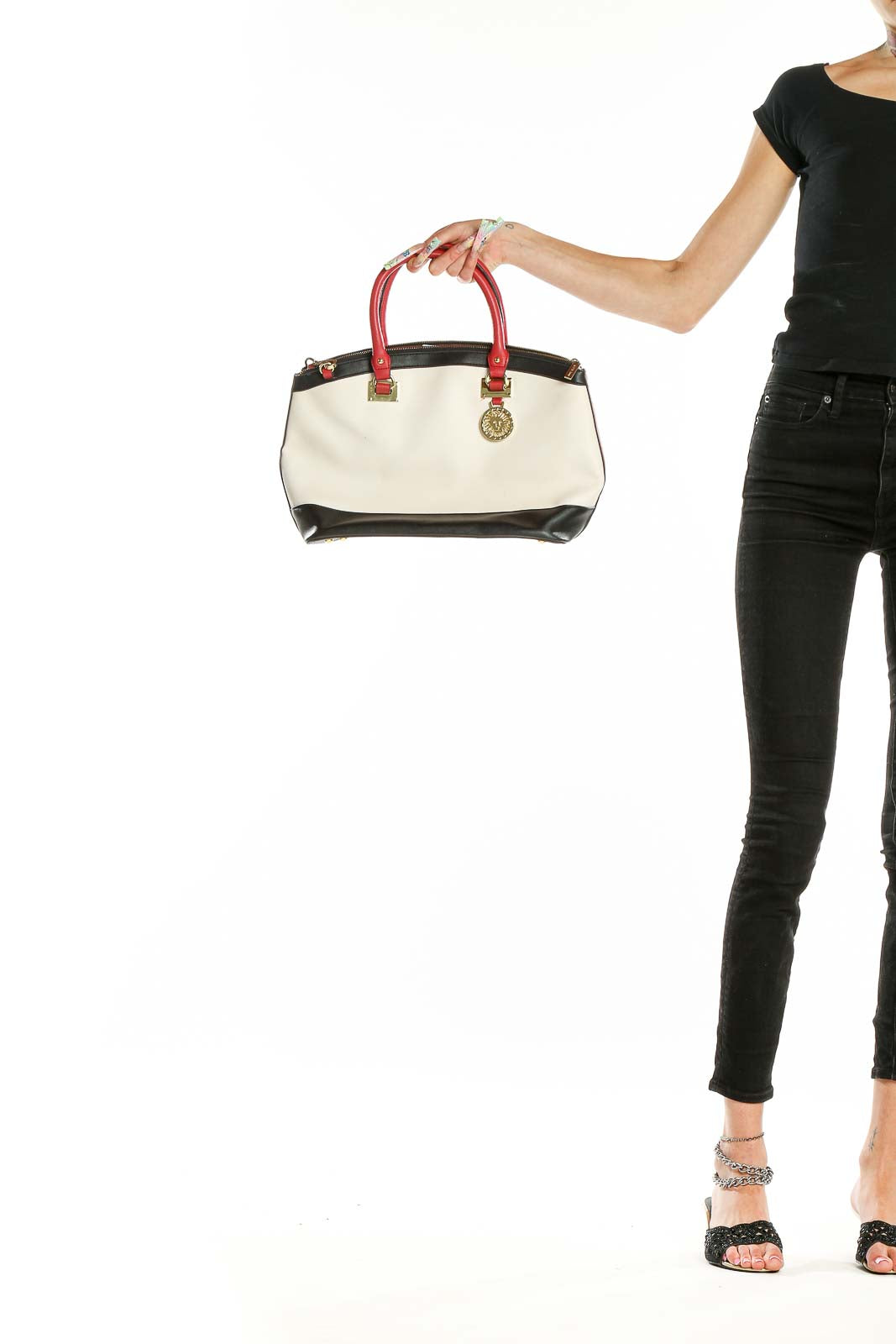 Front view of Anne Klein white and black color-block satchel with red handles