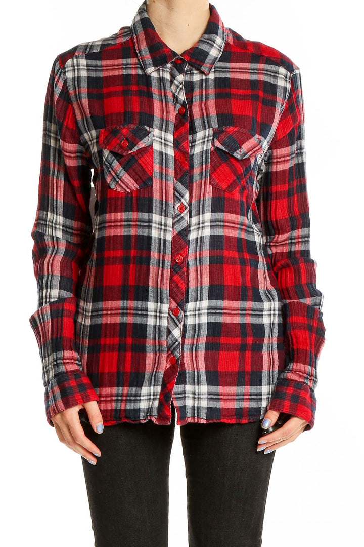 Front view of red plaid cotton button-up shirt from beach lunch lounge