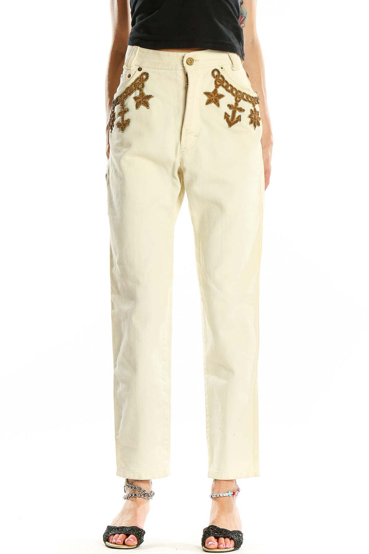 Front view of cream Escada Margaretha Ley high-waisted jeans with nautical embroidery