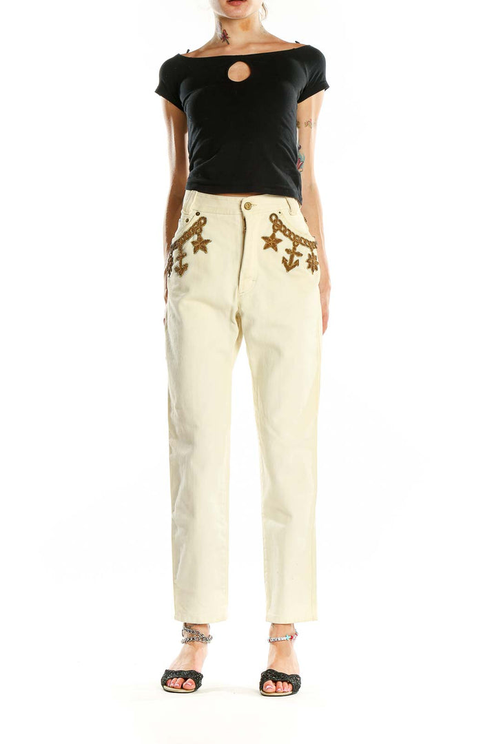 Front view of cream Escada Margaretha Ley high-waisted jeans with nautical embroidery