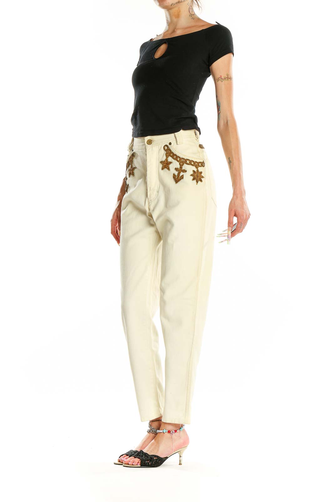 Front view of cream Escada Margaretha Ley high-waisted jeans with nautical embroidery