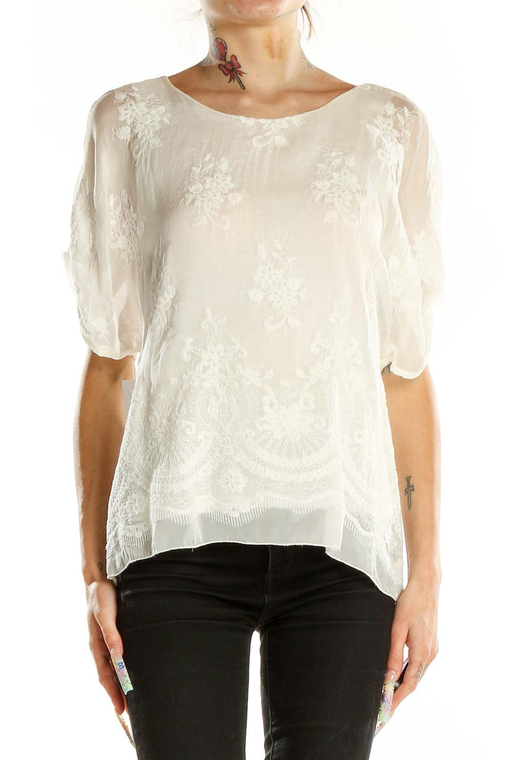 Front view of Angela Moda white sheer blouse with floral embroidery