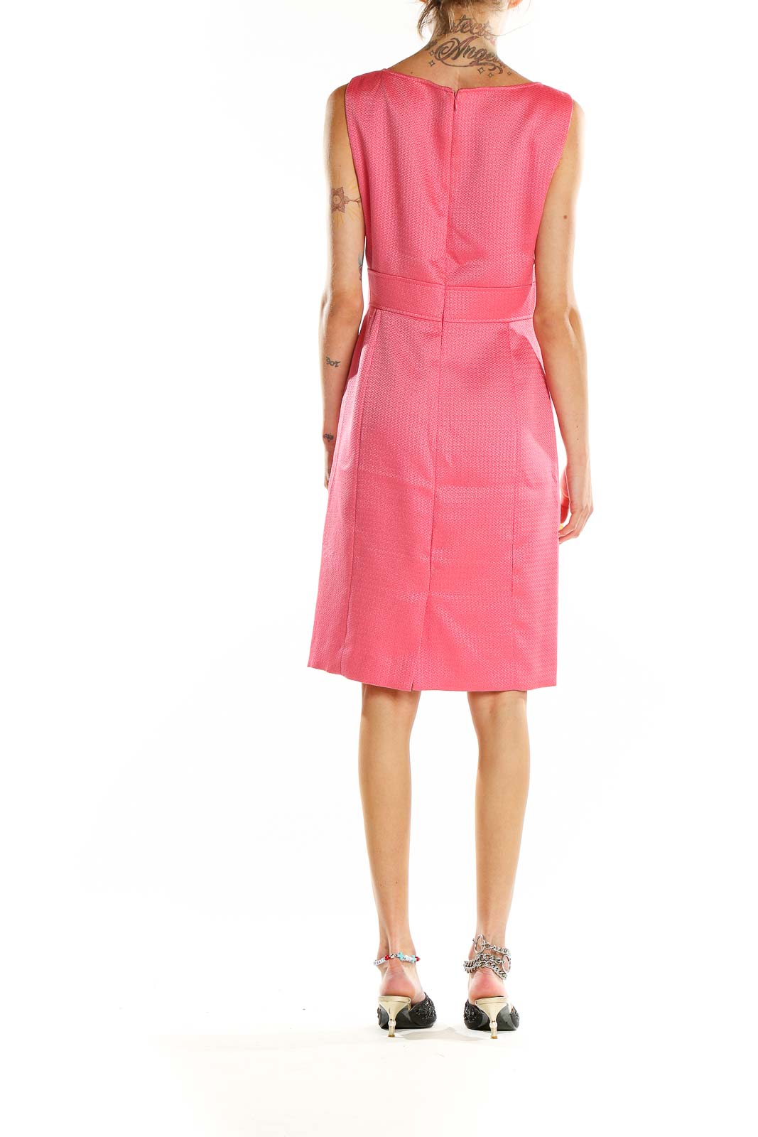 Back view of pink textured sleeveless midi dress showing clean lines and fit