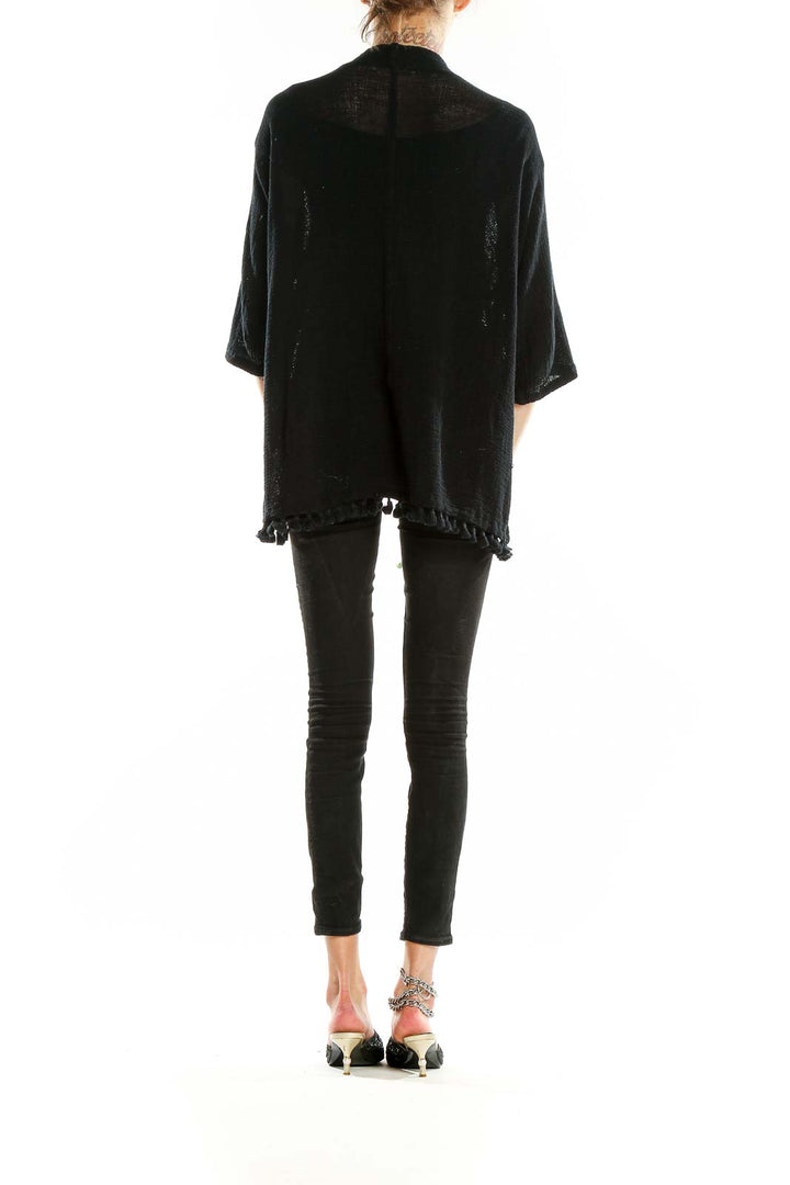 Back view of Michael Stars black cotton knit cardigan showing relaxed fit