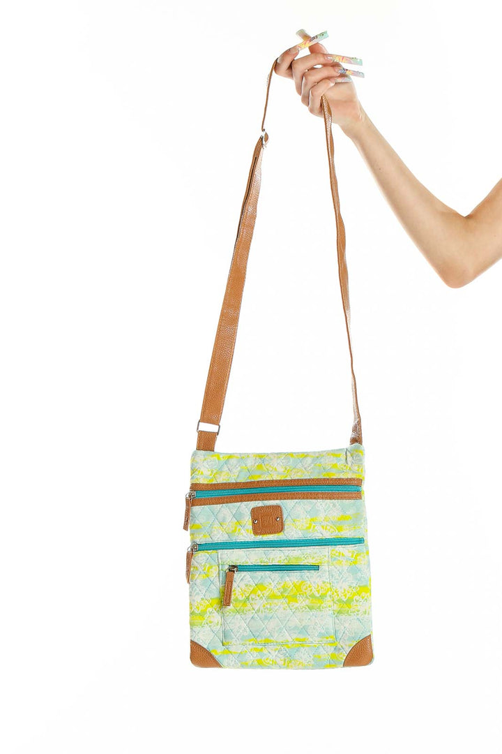 Front view of Stone Mountain mint green geometric print crossbody bag