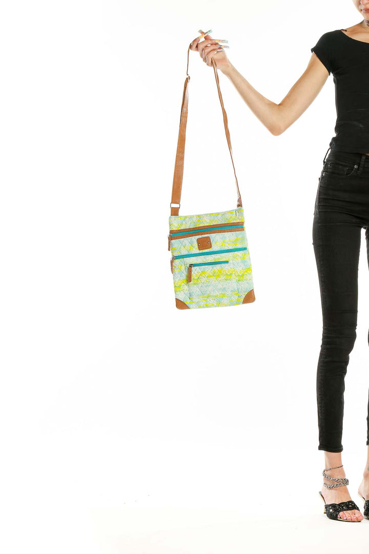 Front view of Stone Mountain mint green geometric print crossbody bag