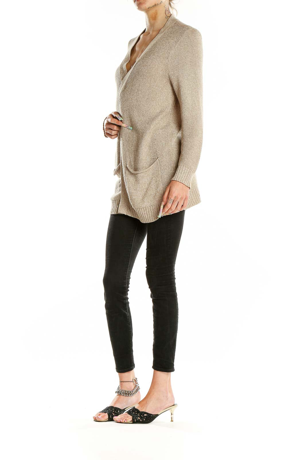 Front view of beige open-front cardigan with pockets