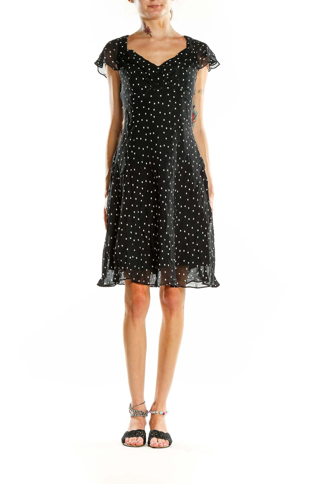 Front view of Evan Picone black polka dot dress with flutter sleeves and sweetheart neckline