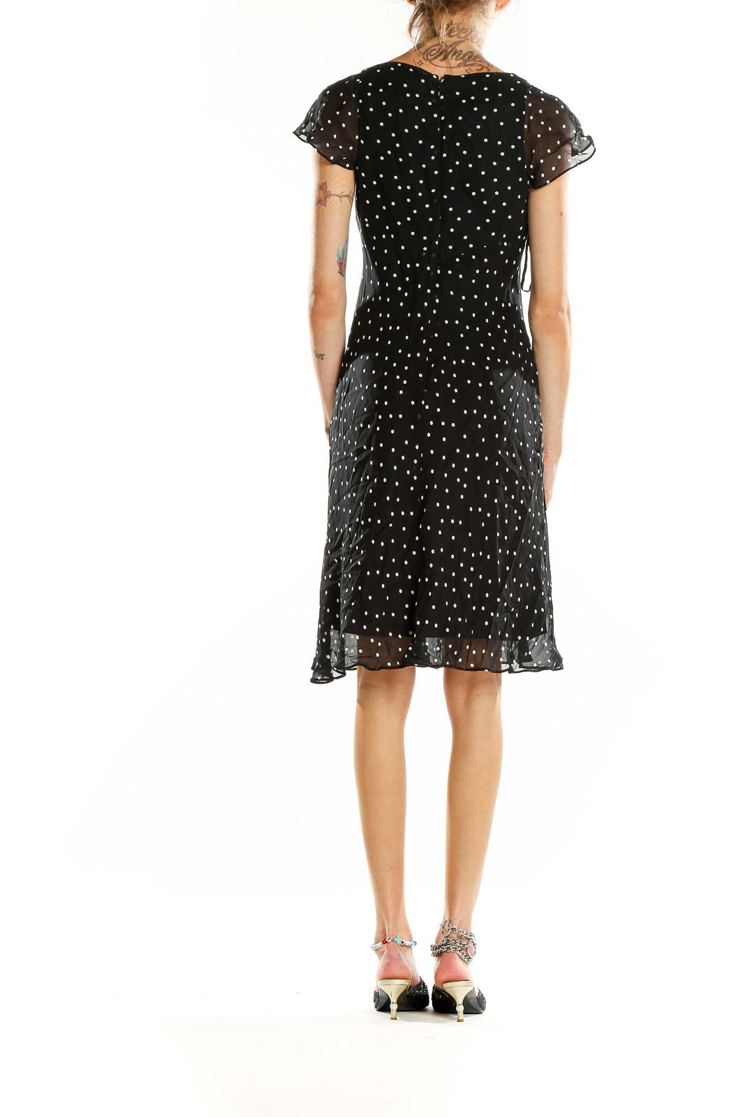 Back view of Evan Picone black polka dot dress showing A-line silhouette