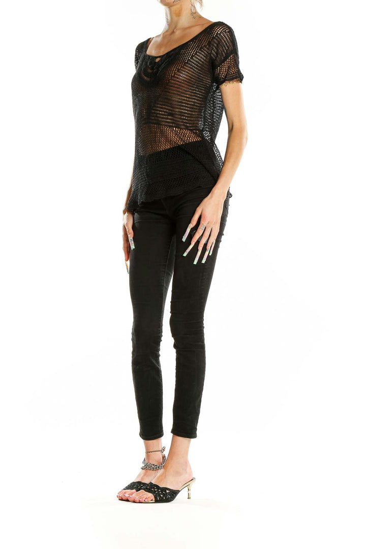 Front view of NIC + ZOE black crochet mesh short sleeve top