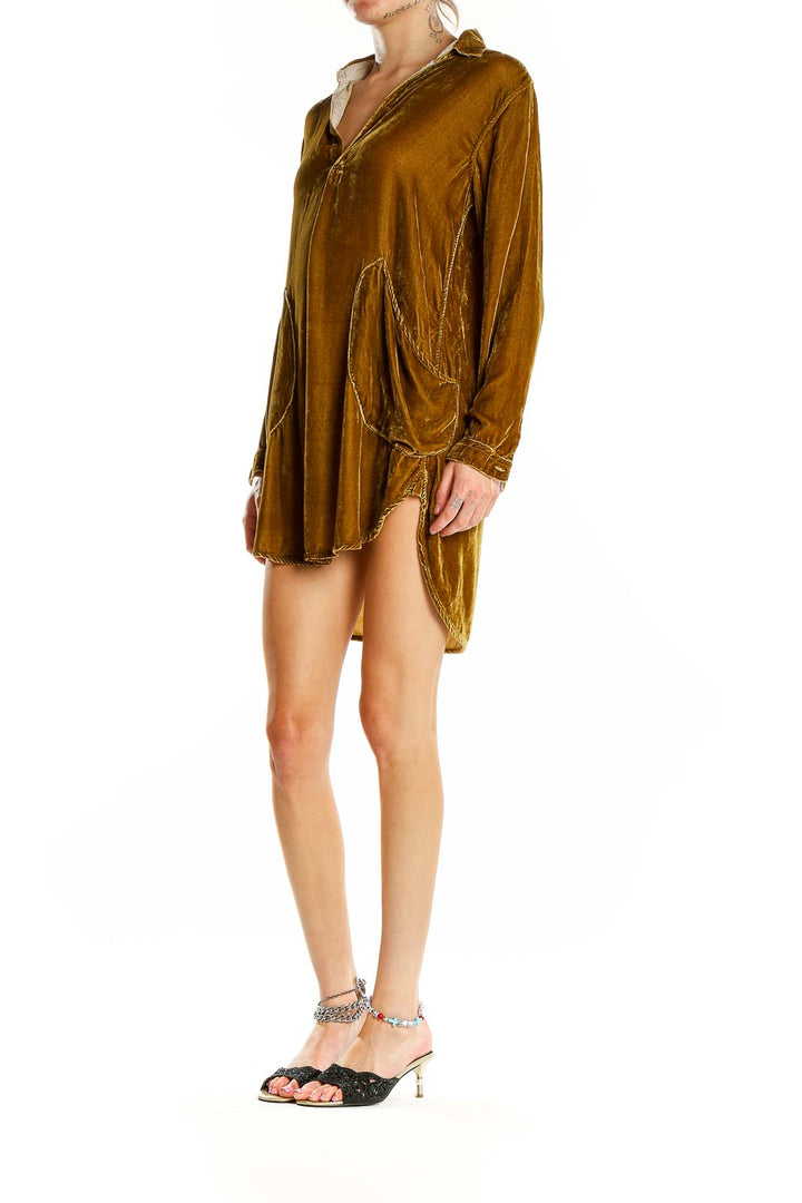 Front view of golden velvet shirt dress by Free People x CP SHADES