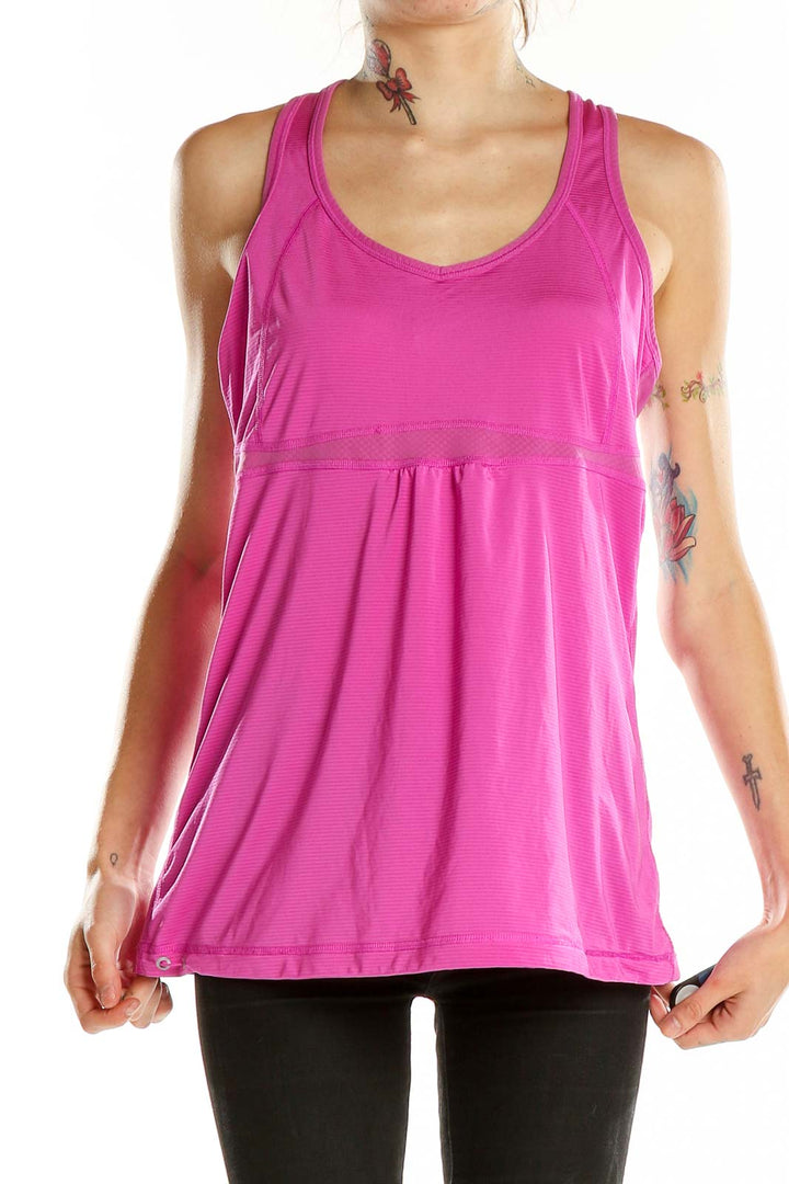 Front view of pink Lucy racerback workout tank with flowy fit