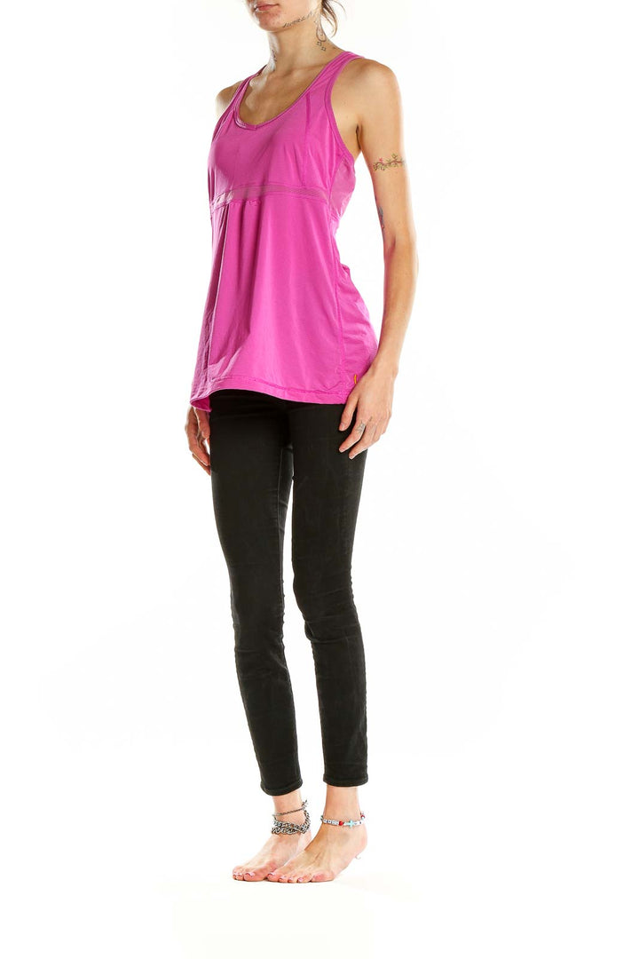 Front view of pink Lucy racerback workout tank with flowy fit