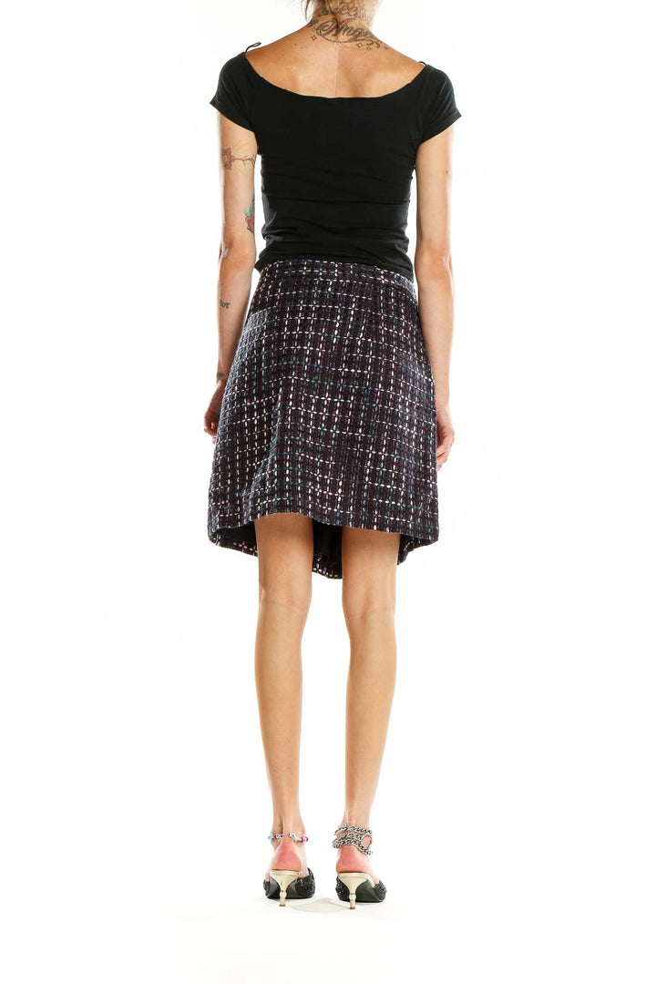 Back view of LOFT Navy Plaid Tweed A-Line Skirt on model