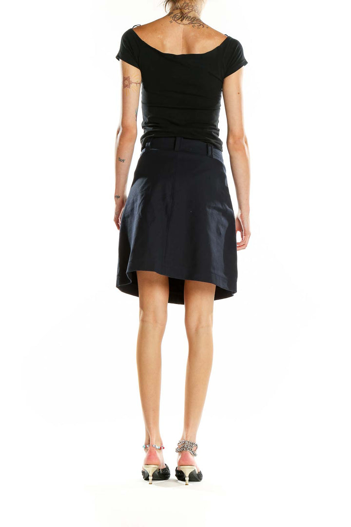 Side view of LOFT navy A-line skirt showing knee-length cut