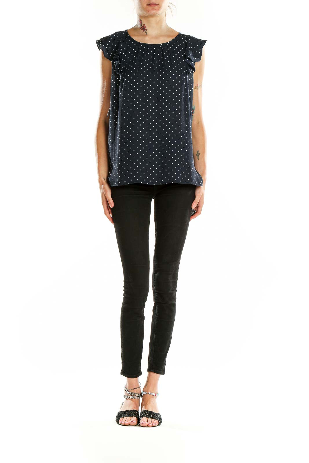 Front view of LOFT navy polka dot blouse with flutter sleeves