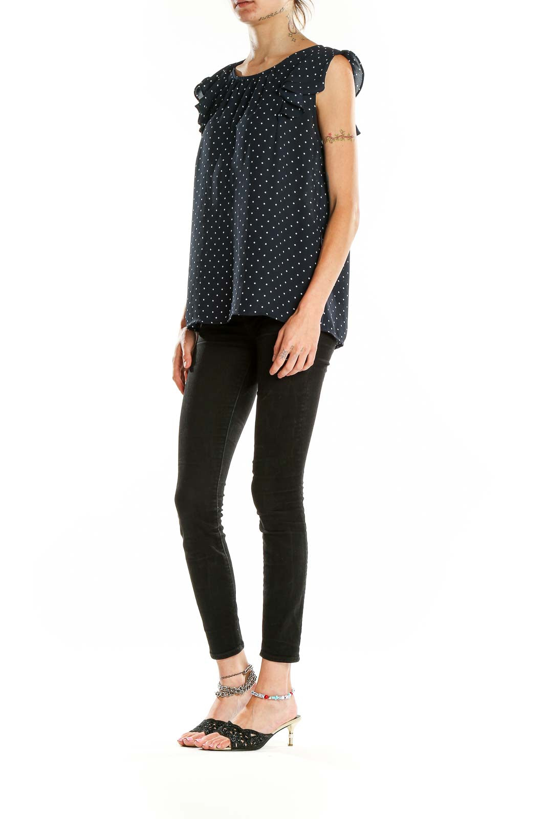 Front view of LOFT navy polka dot blouse with flutter sleeves