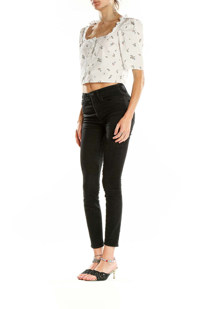 Front view of Levi's white floral cotton crop top with square neckline