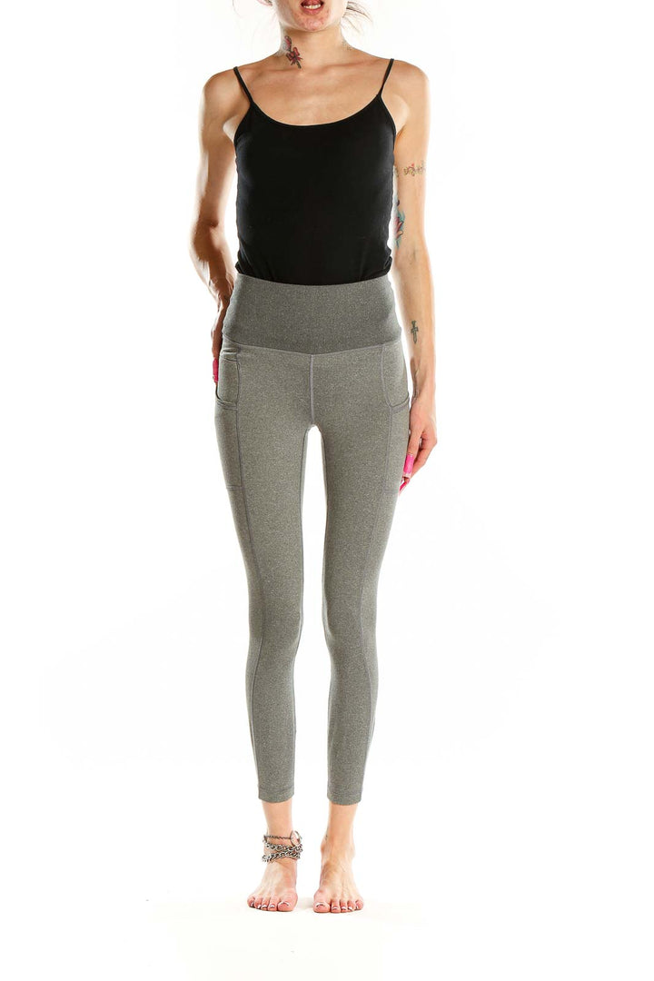 Front view of Patagonia gray high-waisted yoga leggings with side pockets