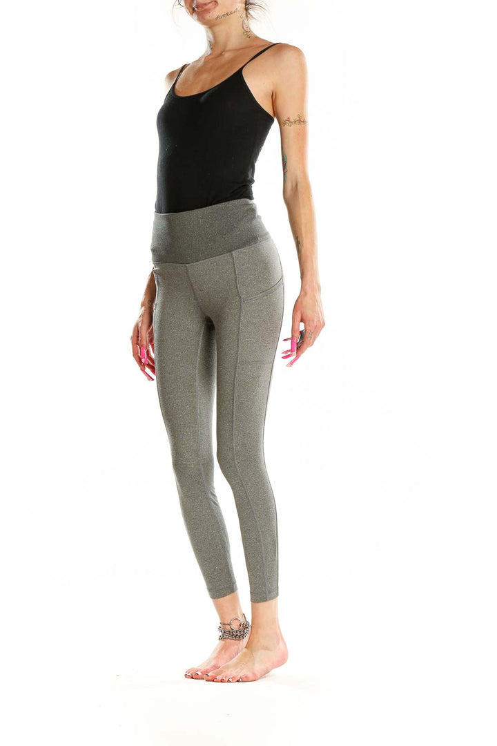 Front view of Patagonia gray high-waisted yoga leggings with side pockets