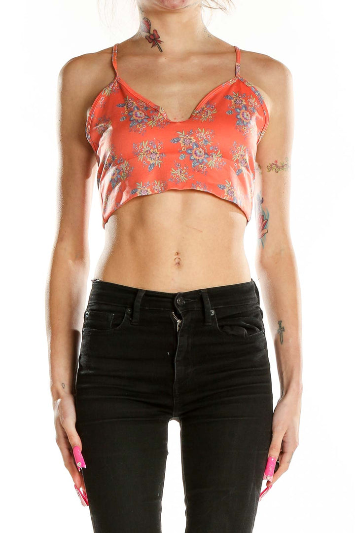 Front view of Anthropologie coral floral cropped camisole with spaghetti straps