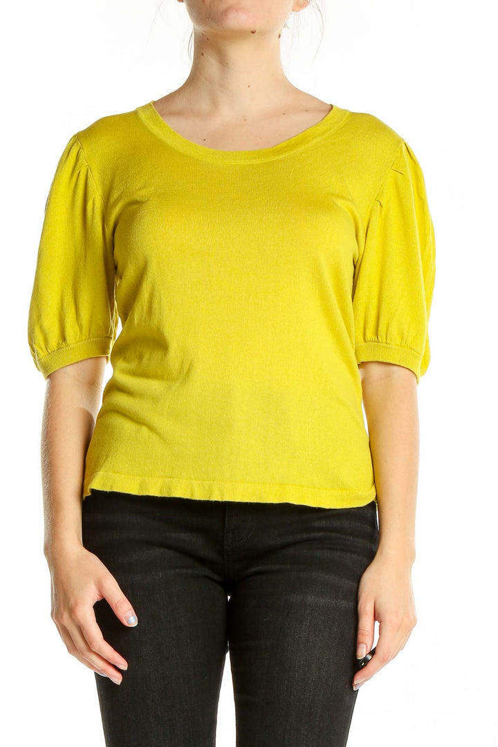 Front view of yellow puff-sleeve top by Current Air