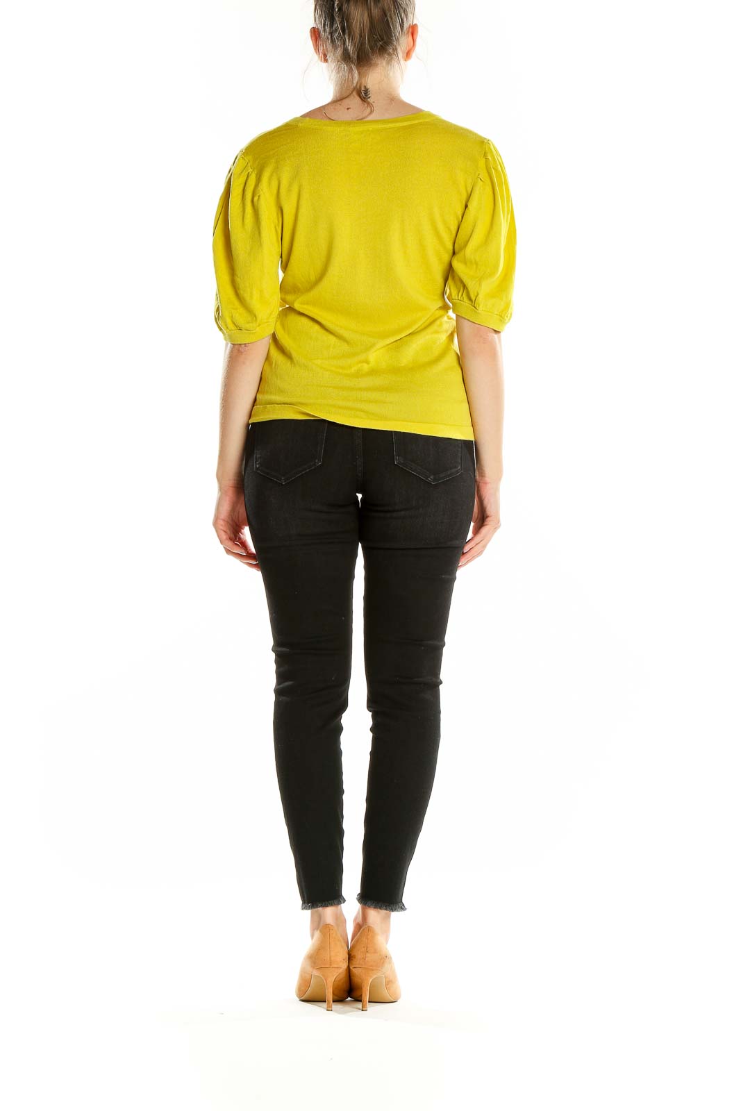 Side view of yellow puff-sleeve top by Current Air on model