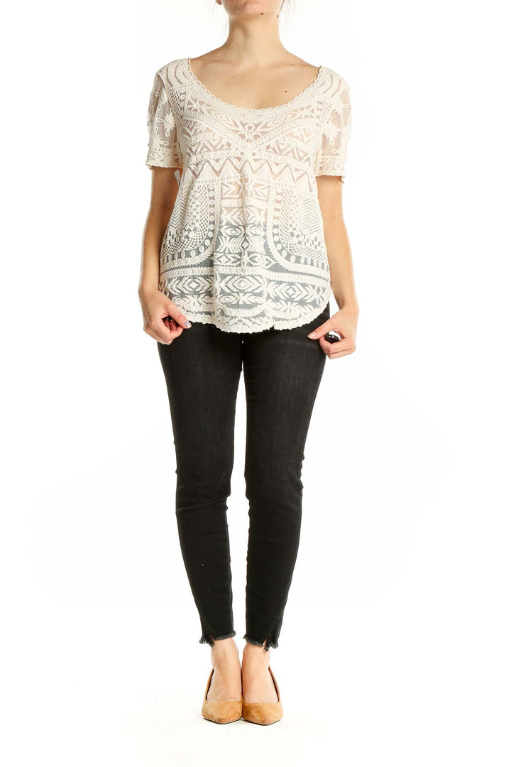 Front view of Meadow Rue white lace overlay top with geometric pattern