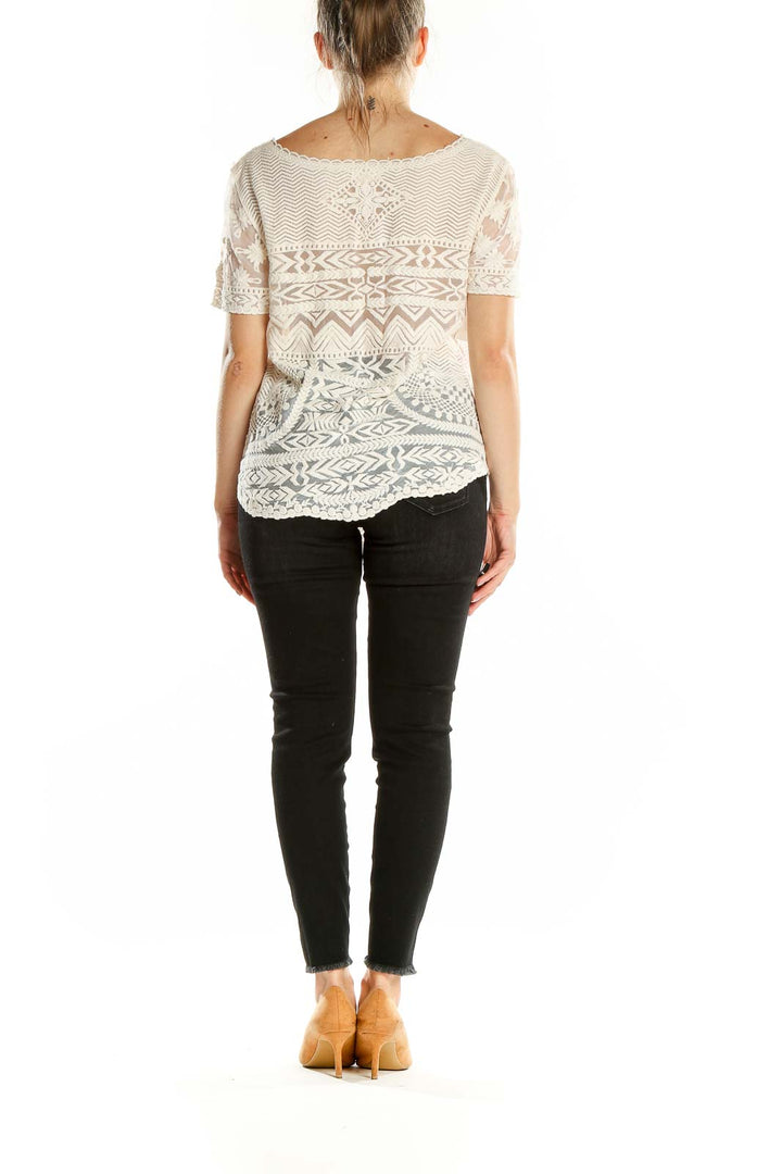 Back view of Meadow Rue white lace overlay top showing intricate lace design