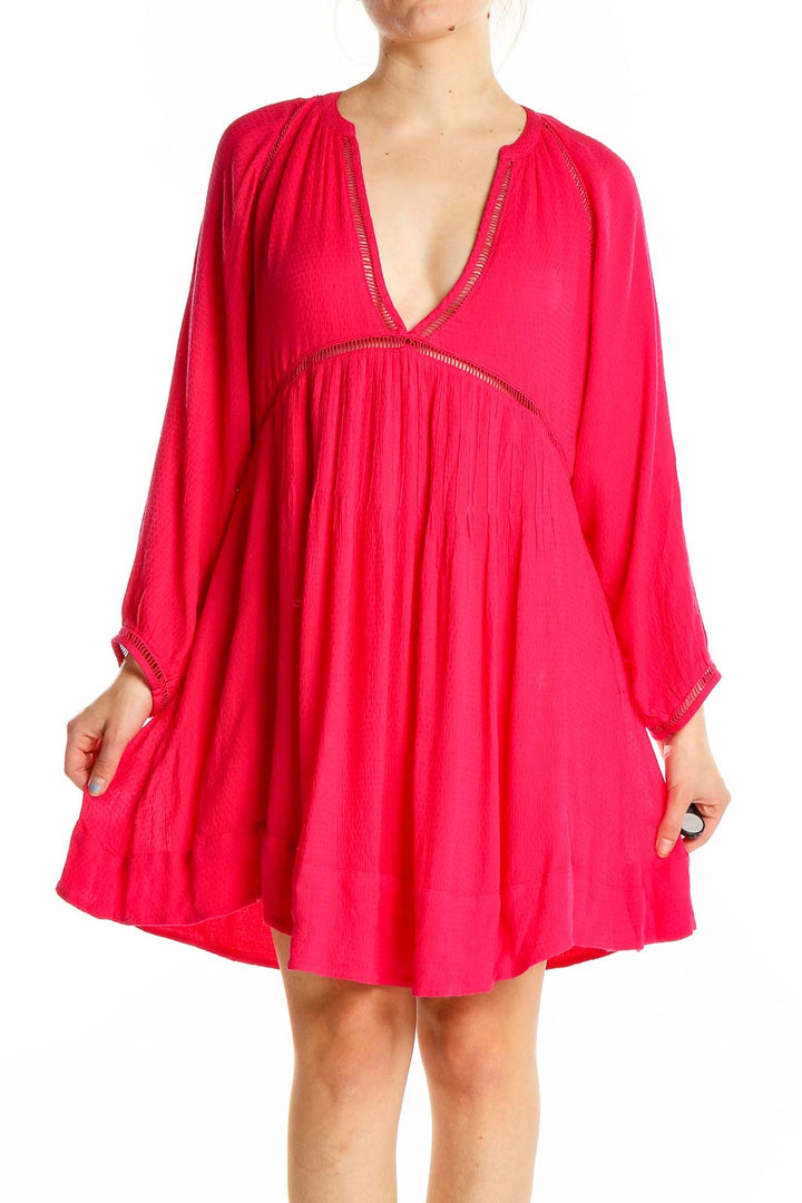 Front view of red flowy Free People boho mini dress with V-neckline