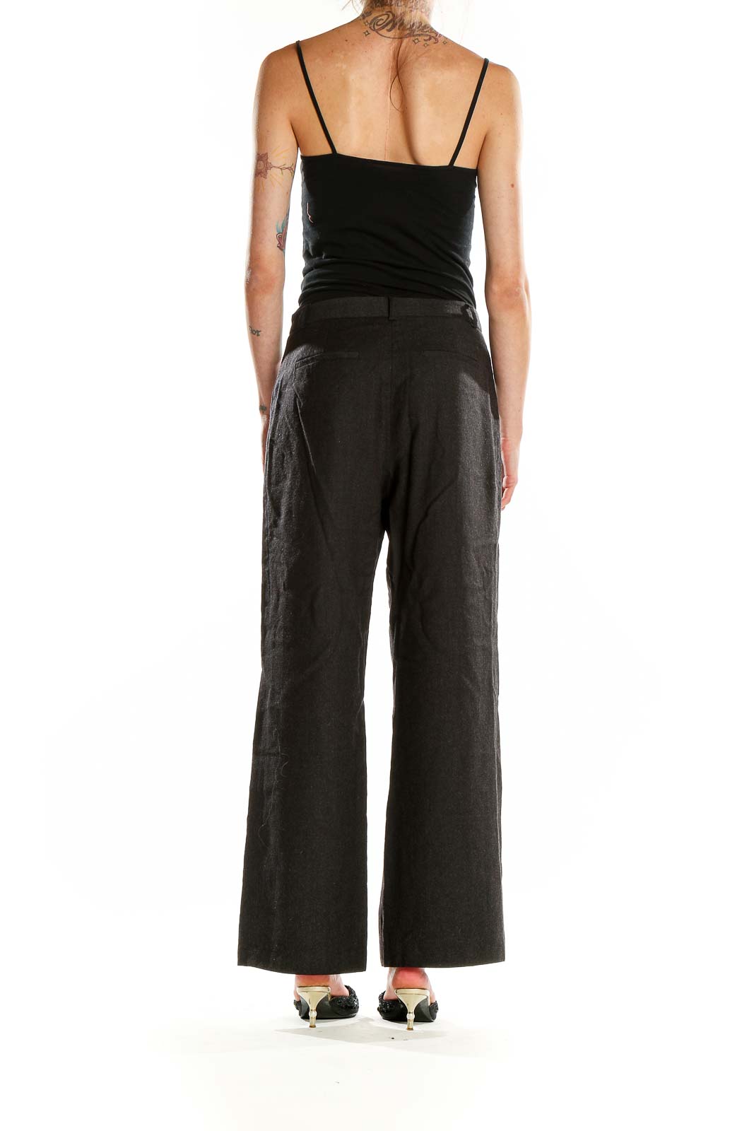 Side view of J.Crew black wide-leg trousers on model