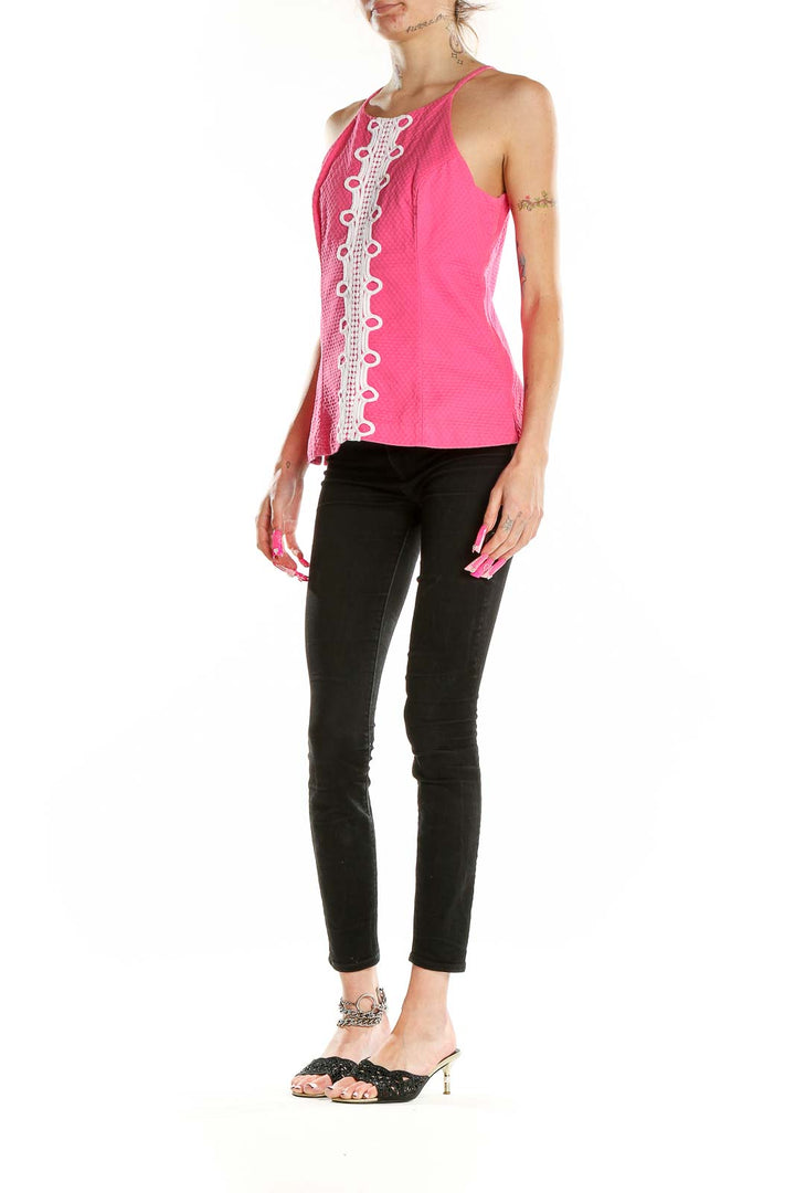 Front view of pink Lilly Pulitzer sleeveless top with white lace trim