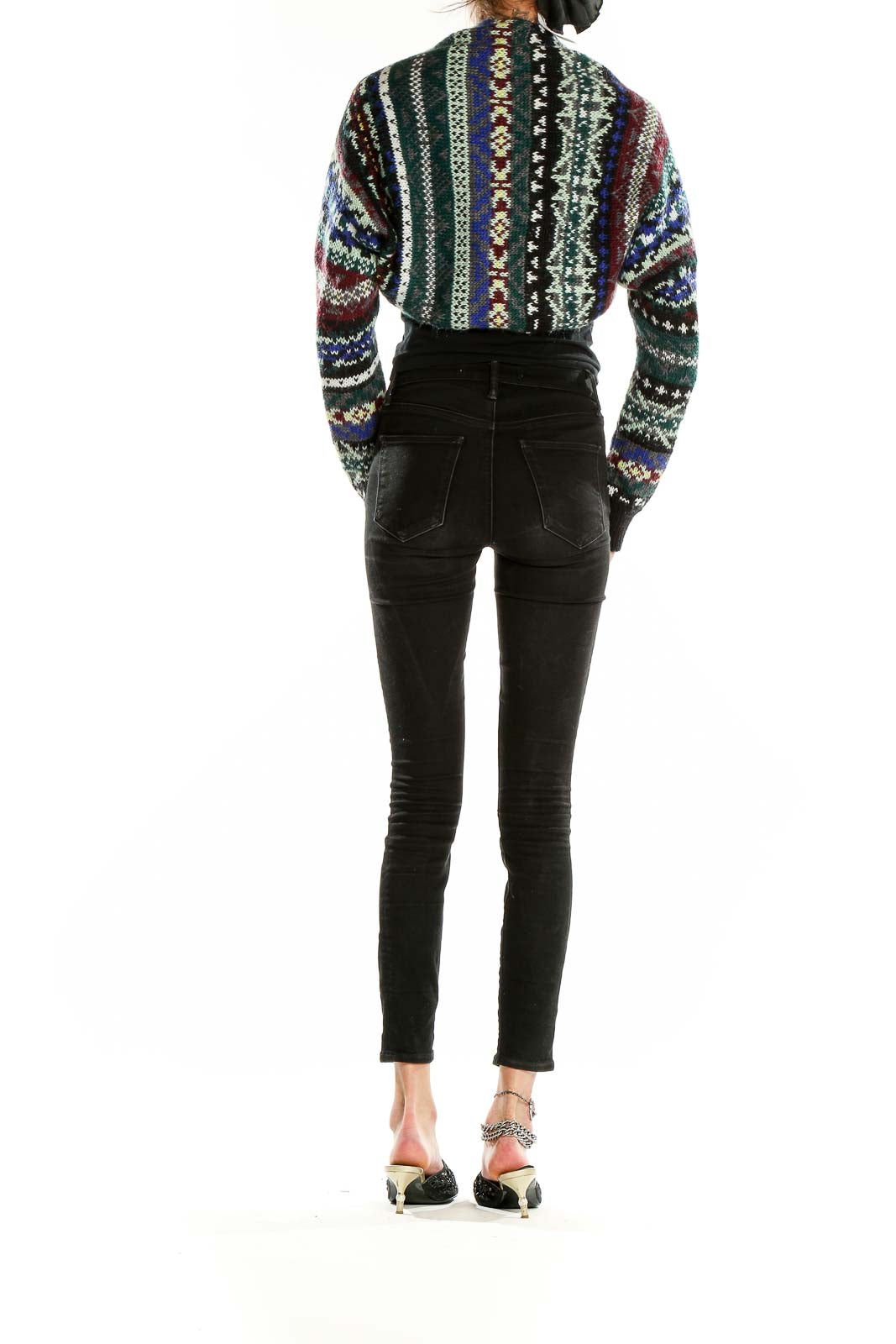 Side view of woman wearing multicolor Fair Isle cropped cardigan with black outfit