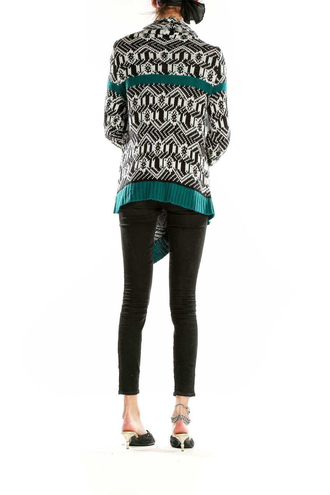 Back view of Romeo & Juliet Couture Black and White Geometric Knit Cardigan showing full pattern and asymmetrical hem