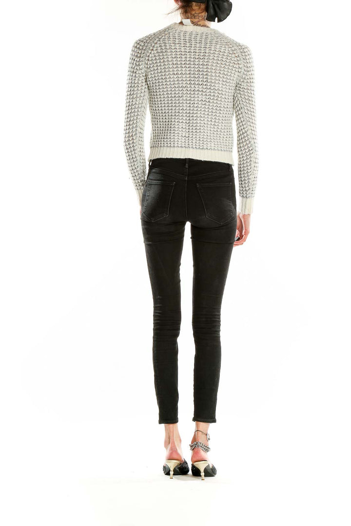 Back view of Joie white cropped knit sweater showing textured pattern