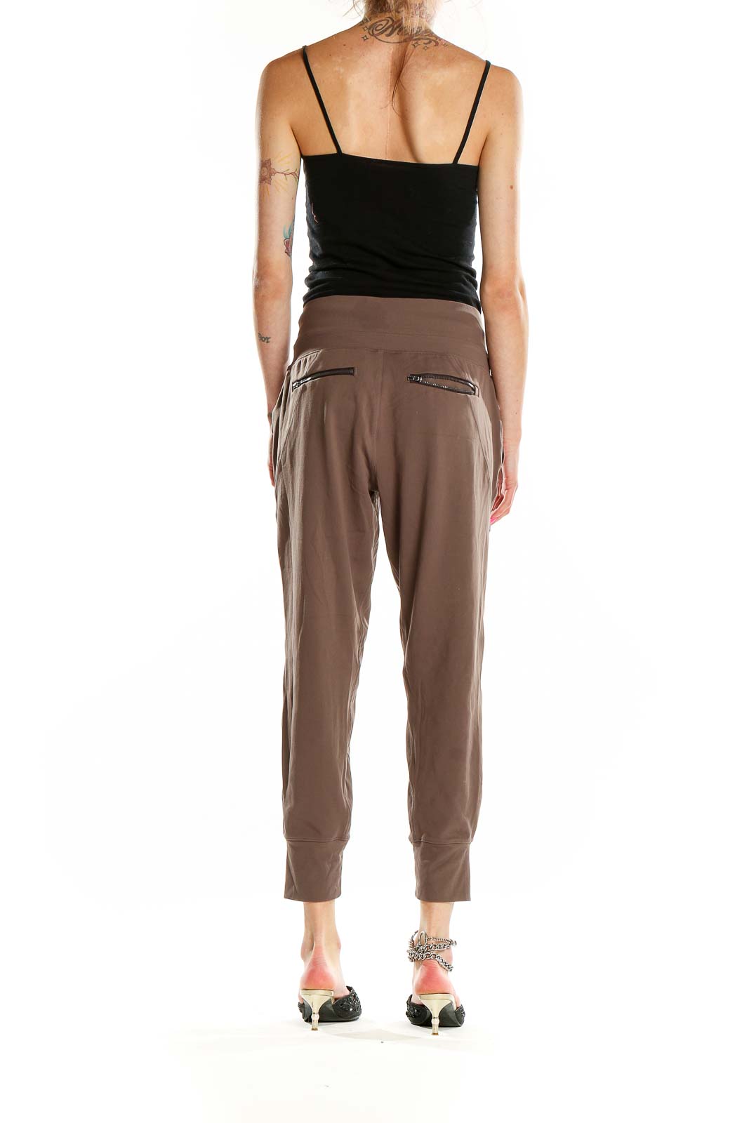 Back view of Athleta brown jogger pants showing relaxed fit and tapered ankle cuffs