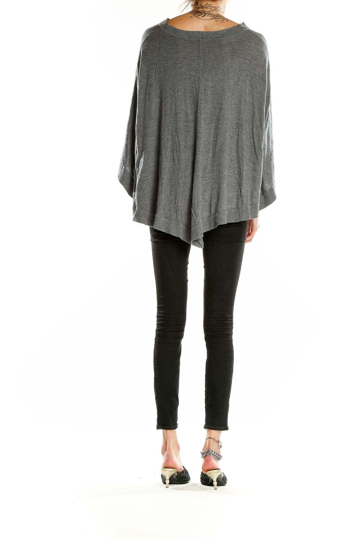 Back view of Splendid gray cashmere blend poncho showing asymmetrical hemline