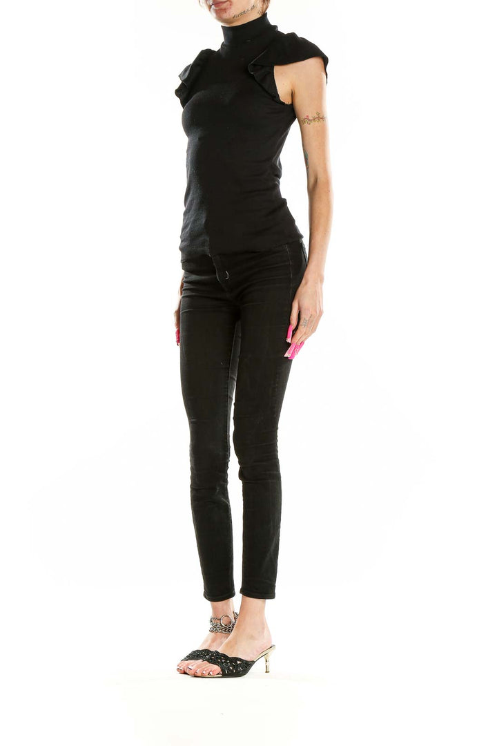 Front view of black Chaser top with ruffled cap sleeves and mock neck