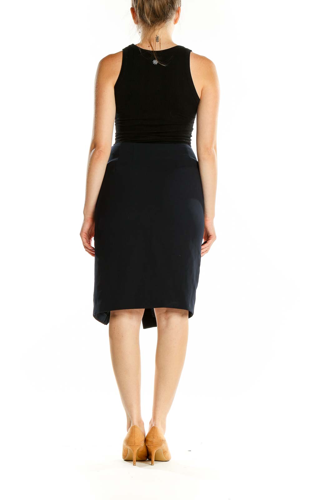 Back view of DKNY black asymmetrical wrap pencil skirt on model