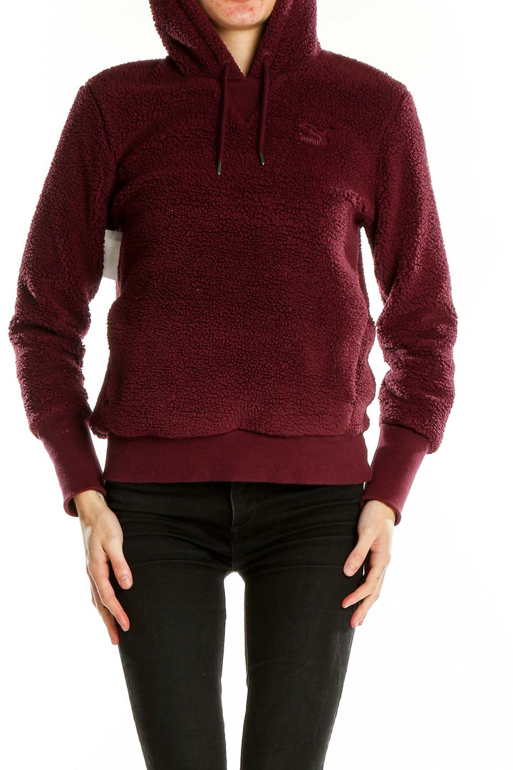 Front view of burgundy Puma fleece hoodie pullover