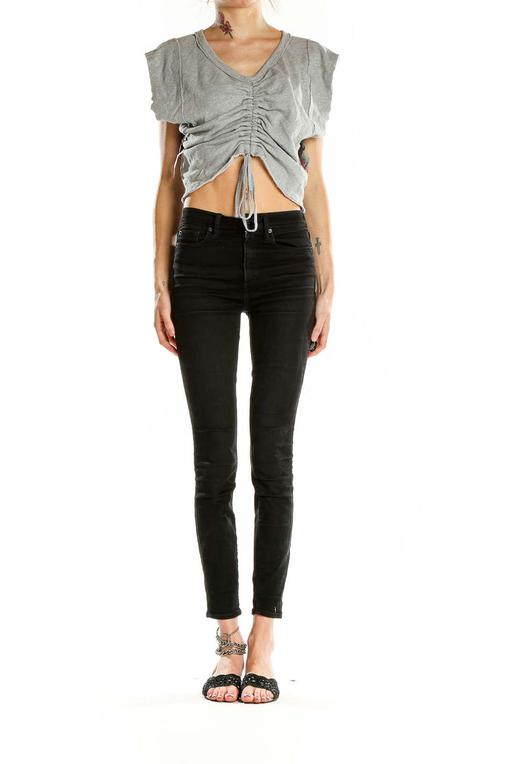 Front view of gray ruched V-neck crop top with drawstring detail