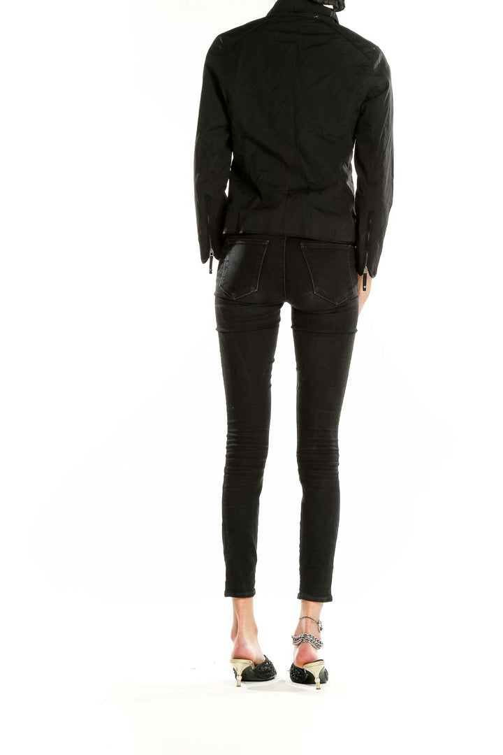 Side view of black Bernardo utility jacket showing tailored silhouette