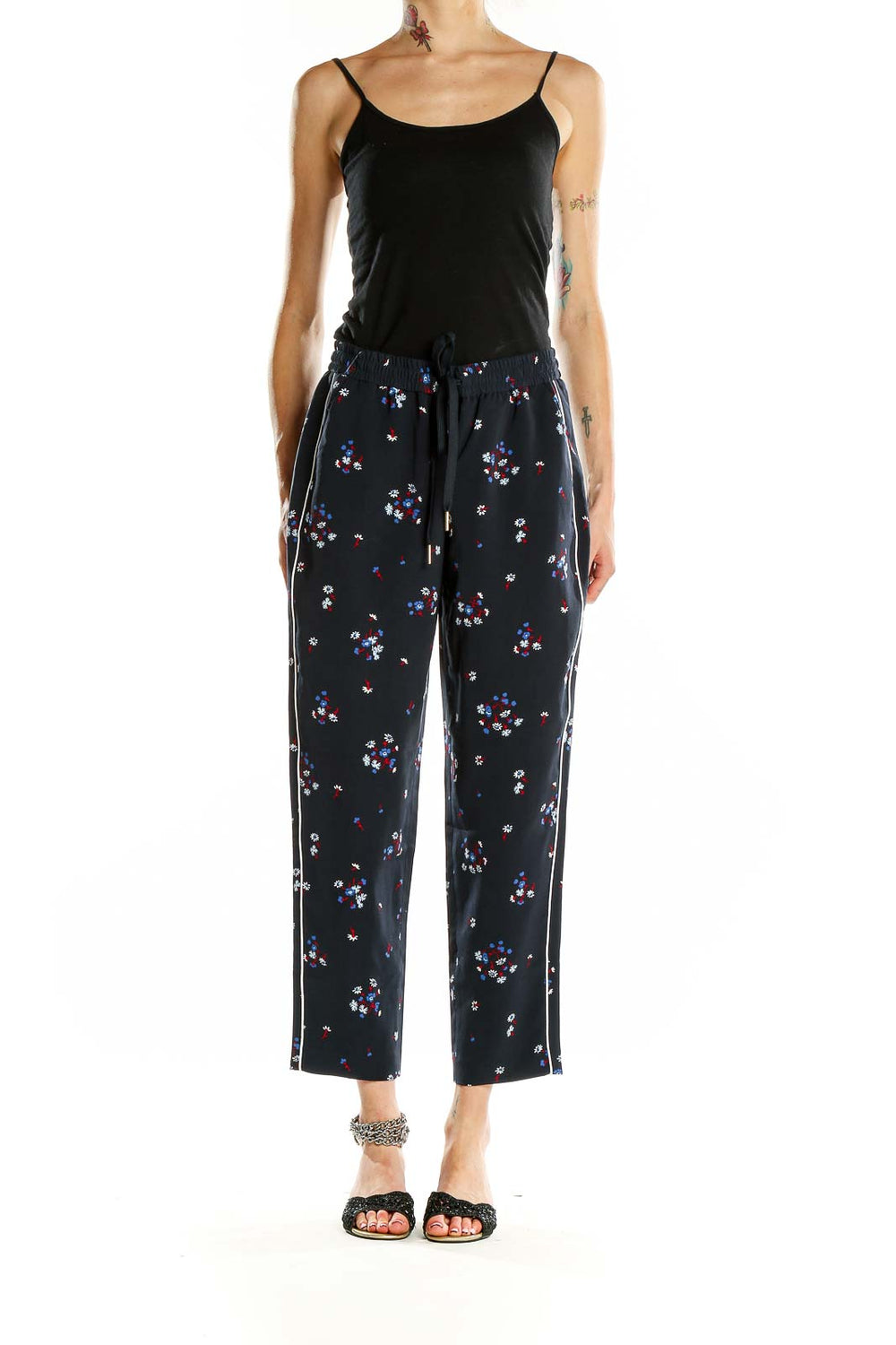 Front view of Tommy Hilfiger navy floral print drawstring pants with side stripe