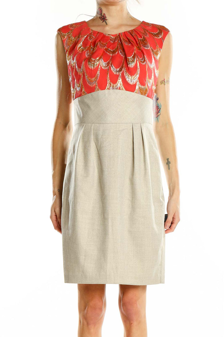 Front view of Trina Turk red feather print cocktail dress with beige skirt