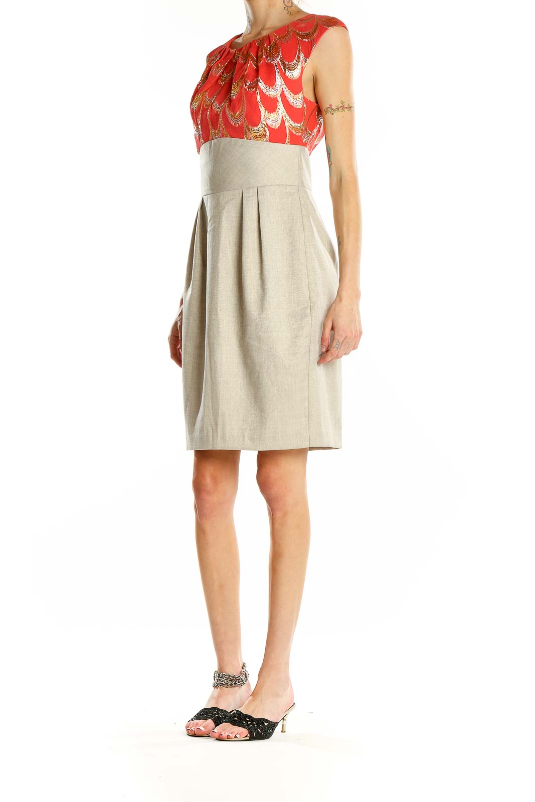 Front view of Trina Turk red feather print cocktail dress with beige skirt