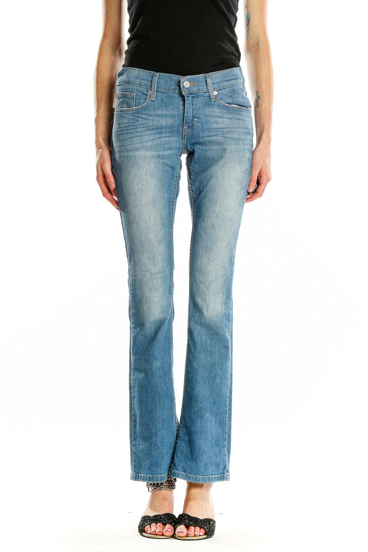 Front view of Levi's light blue bootcut jeans on model