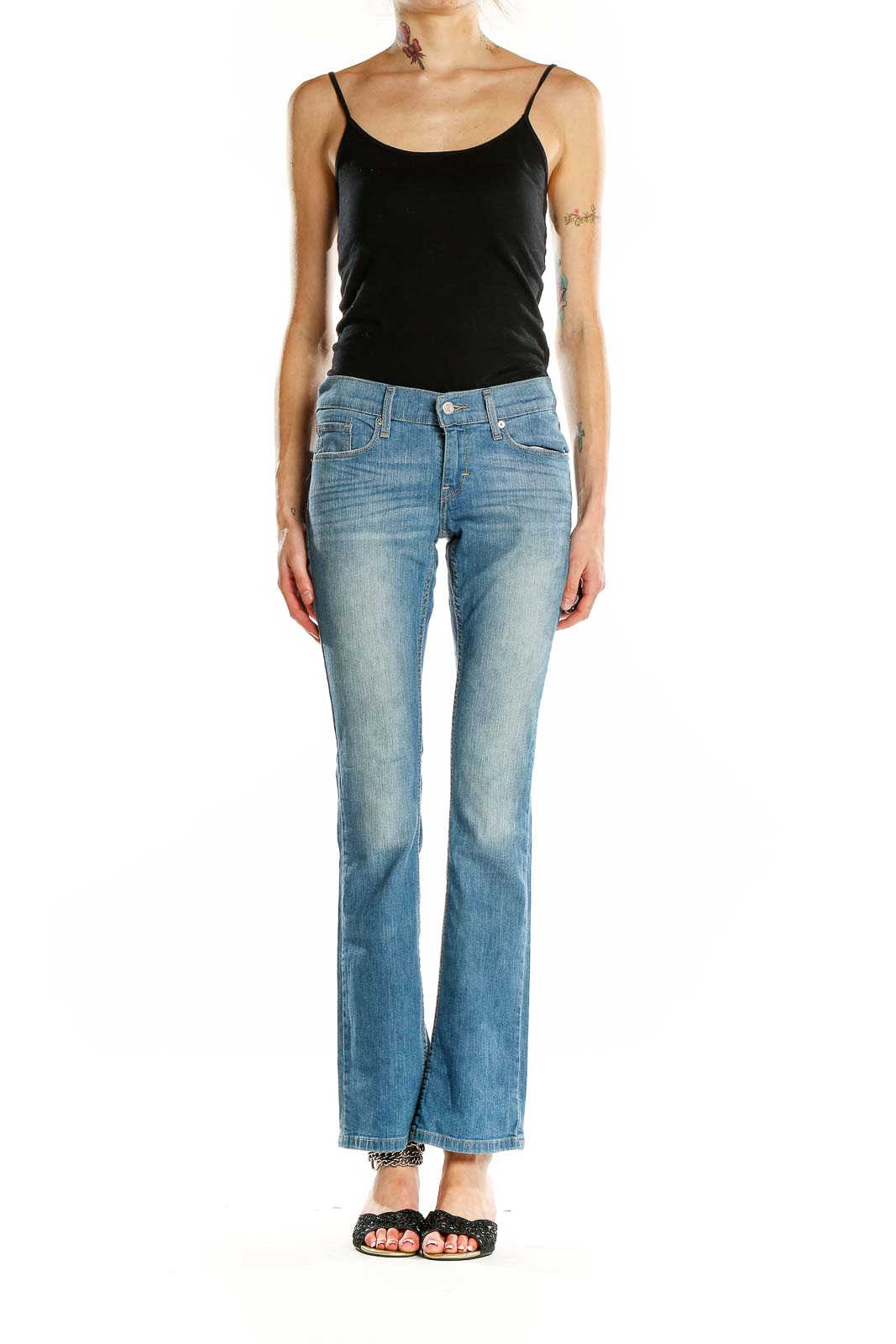 Front view of Levi's light blue bootcut jeans on model