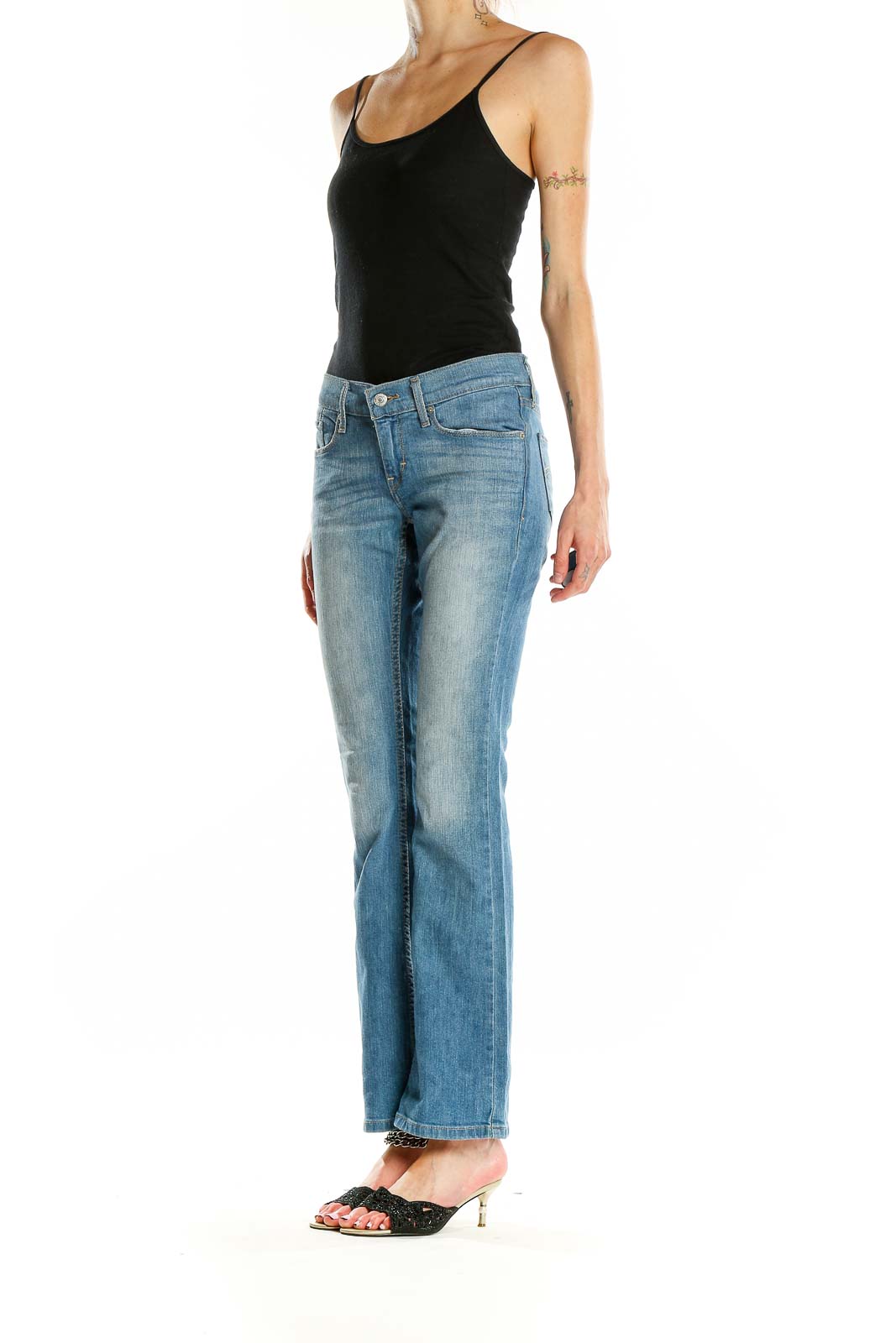 Front view of Levi's light blue bootcut jeans on model