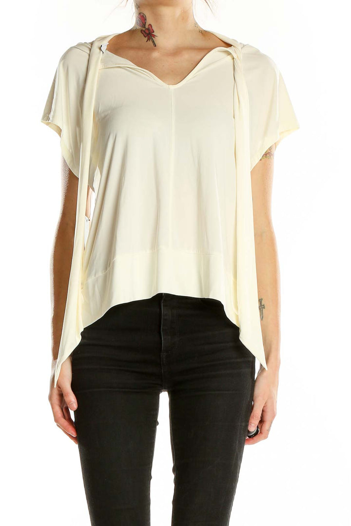 Front view of Nine West cream v-neck hooded flowy top