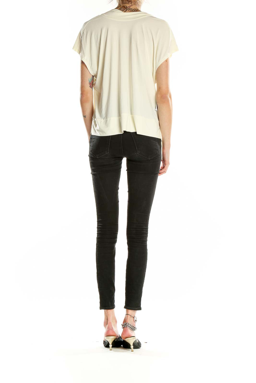 Back view of Nine West cream v-neck hooded flowy top with high-low hemline